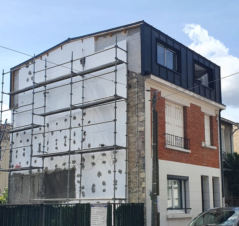 Surelevation of a house with zinc