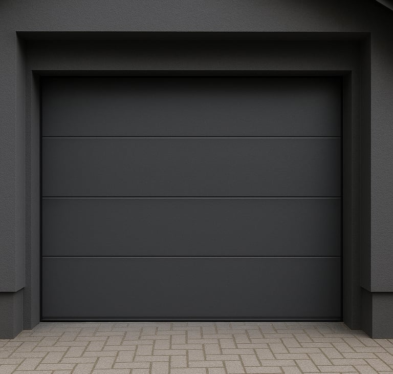 Porte de garage sectionnelle gris anthracite installée sur une maison moderne Isovergne