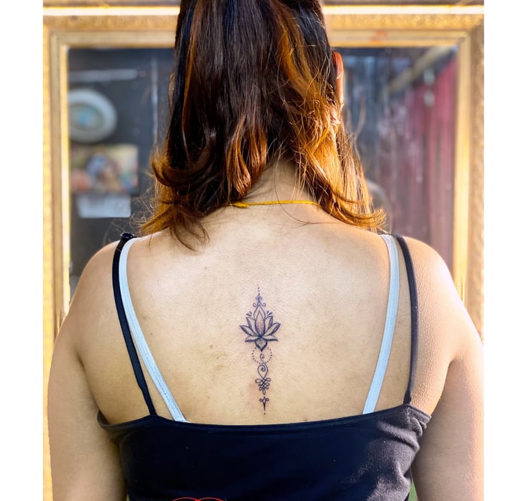 Woman tattoo-tattoo baba-Best Tattoo Studio In Jaipur