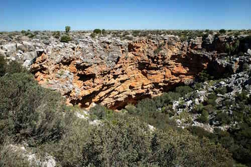 Cave entrance homes to masked owls and kestrels