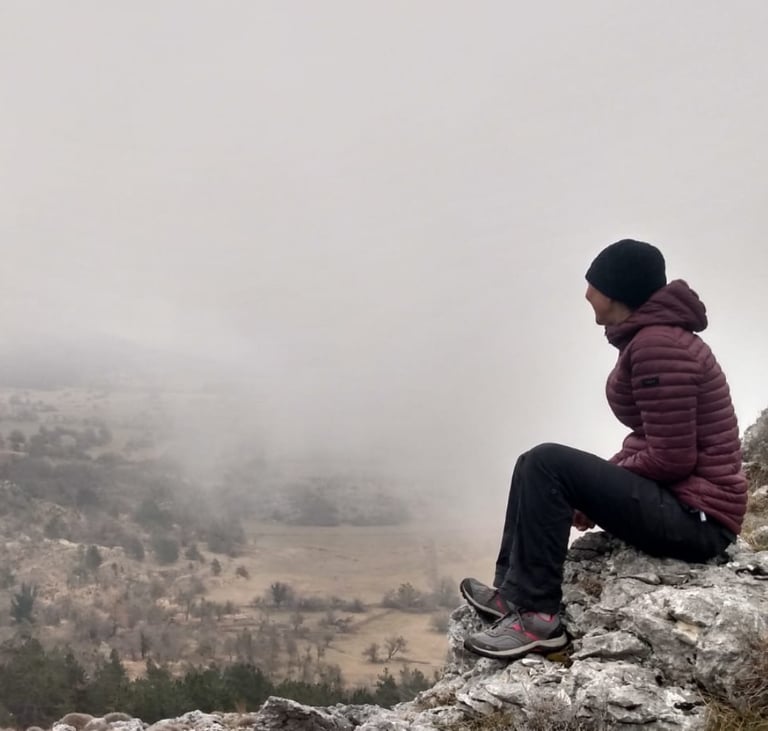 Kirsti in nature on the French Riviera reflecting her connection to personal growth and inner work