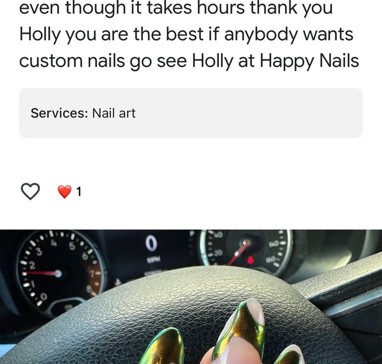 Custom green chrome swirl nail art design by Happy Nails Doylestown shown over a steering wheel.