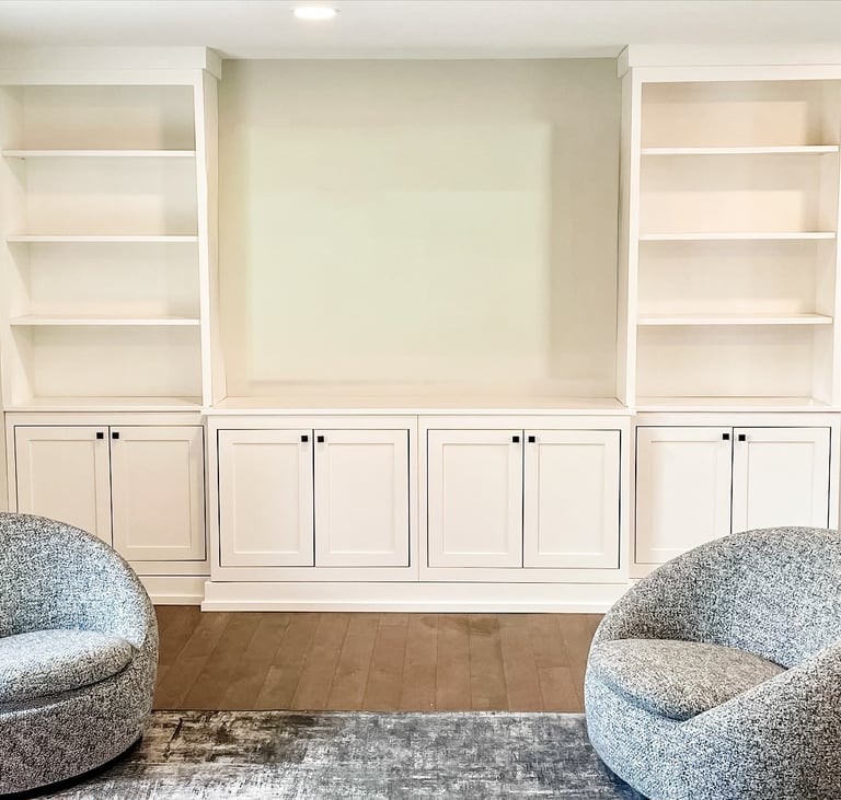 Custom built in wall unit with shelving and cabinetry for a Pearce Woodworks Detroit client.