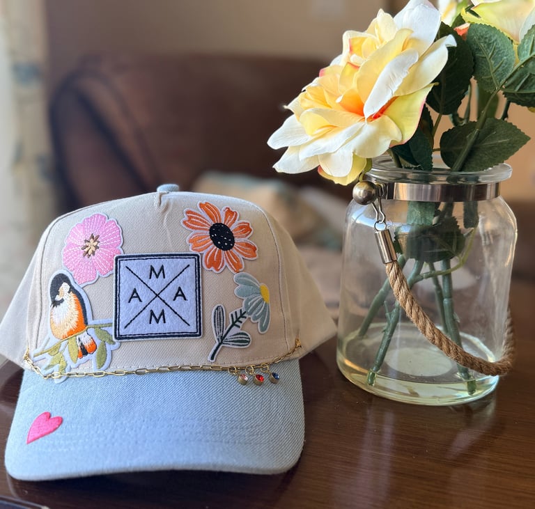 mama hat with flowers and bird