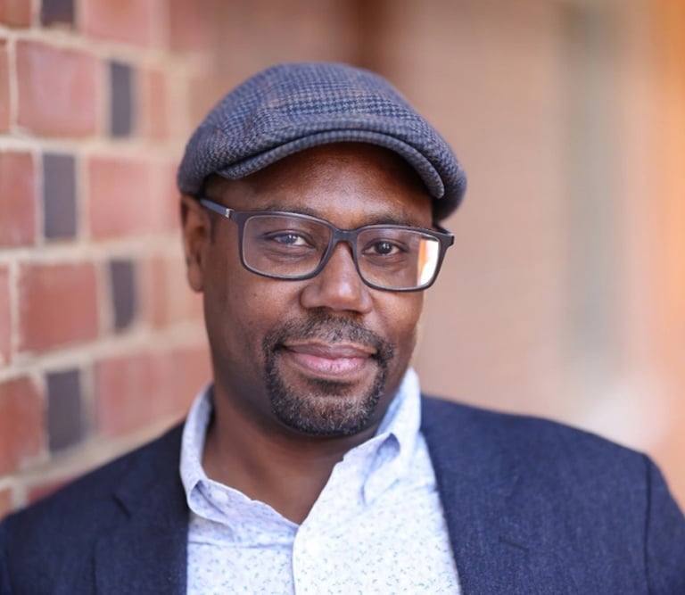 Rone Shavers, MFA vs PhD