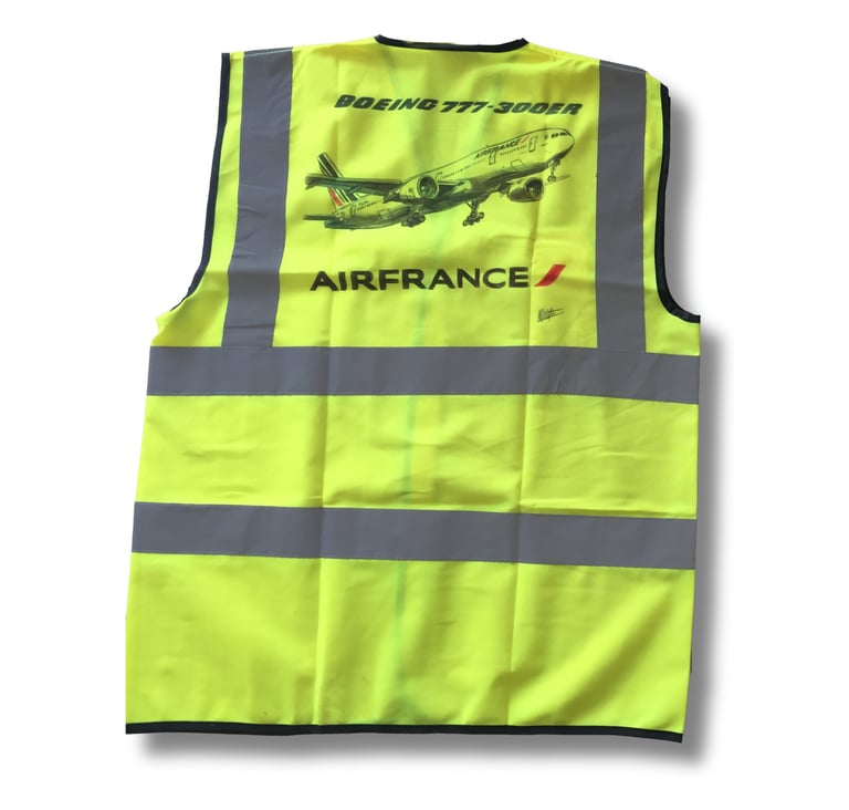 Photo d’un gilet haute visibilité personnalisé avec un dessin d’avion pour Air France