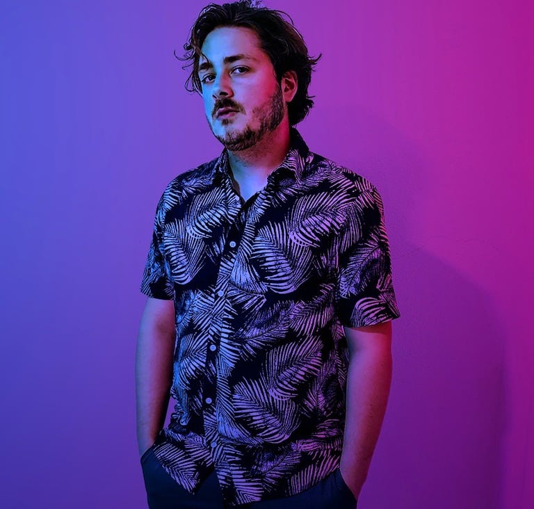 a man with a beard and a black shirt