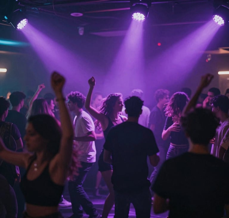 A wide shot of a crowded dancefloor in a sophisticated high-end club, motion blur on dancers, vibrant purple light rays cutting through haze, energetic nightlife vibe, #2C2D3B and #E0E0EB highlights.