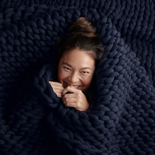 Bearaby cotton hand-knit weighted blanket in midnight blue OEKO-TEX certified organic