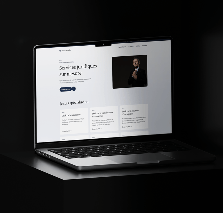 A laptop screen displaying a webpage of David Aebischer