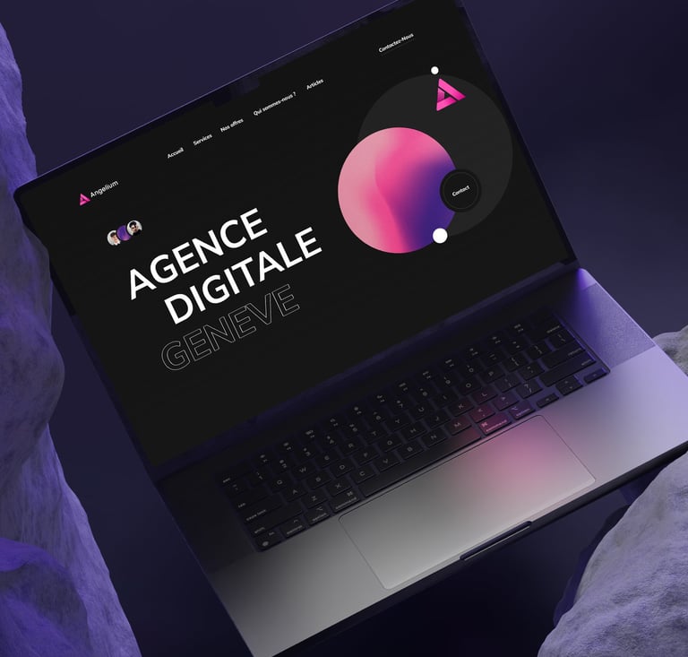 A laptop on a rock displaying the Angelium.ch website