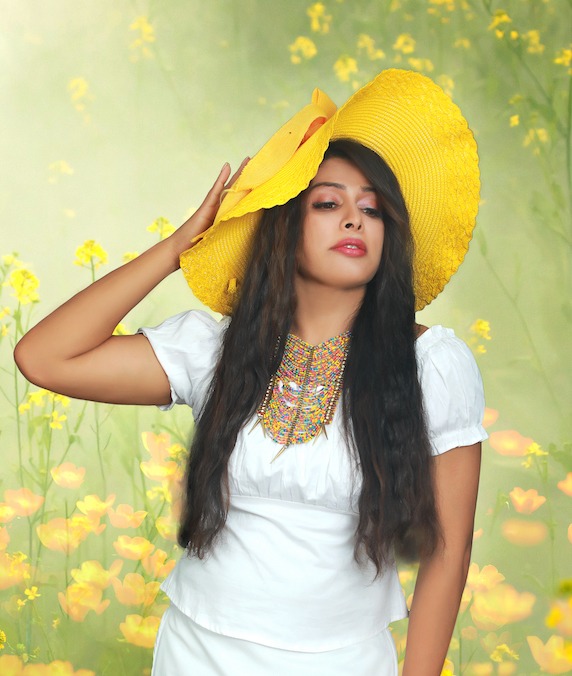 Woman wearing statement necklace in multicolor