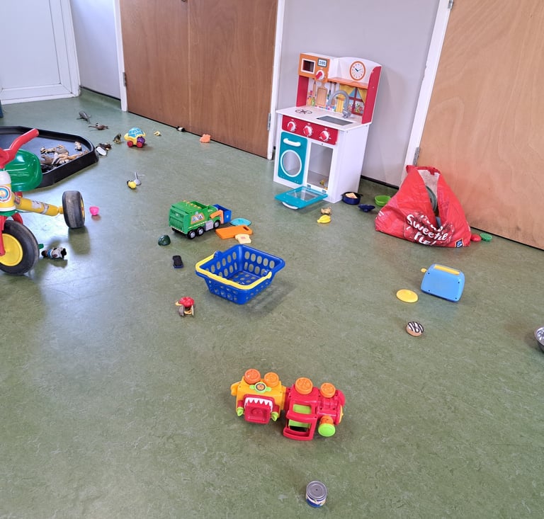 Toys set up inside Elsenham Memorial Hall for Little Fishies toddler group session.