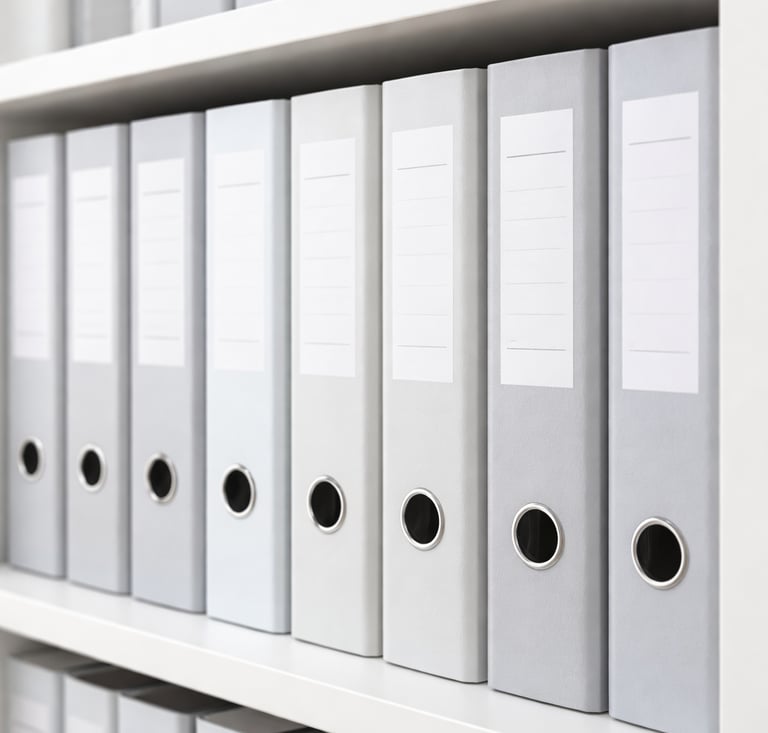 Folder cabinet filled with grey folders
