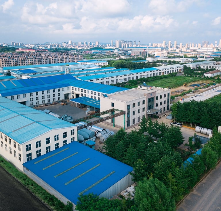 a large building with a blue roof and a blue roof