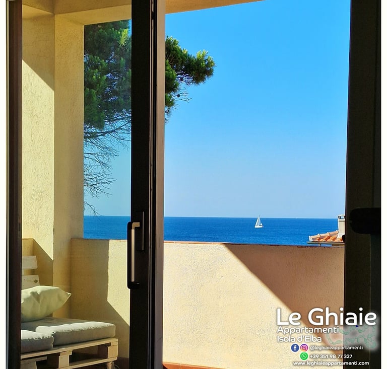 Sailing boat at Le Ghiaie beach in Portoferraio