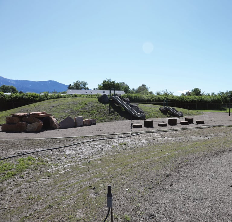 a playground with swings, swings, and swings