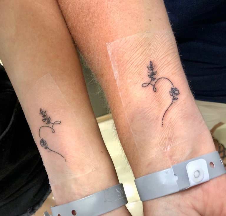 Minimalist heart tattoo on wrist — Hurghada Tattoo Studio