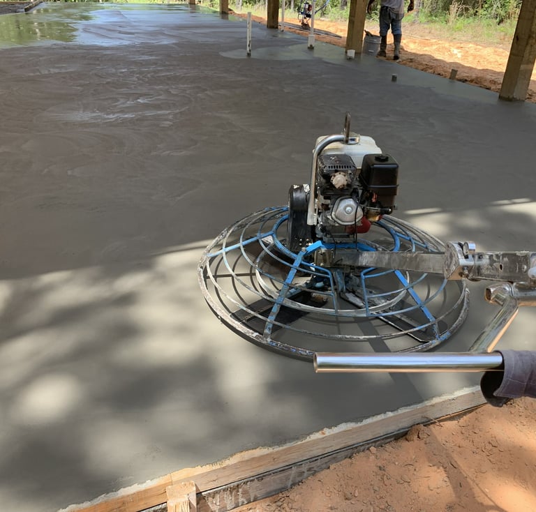 Concrete pouring and finishing process in Navarre FL by professional concrete contractor