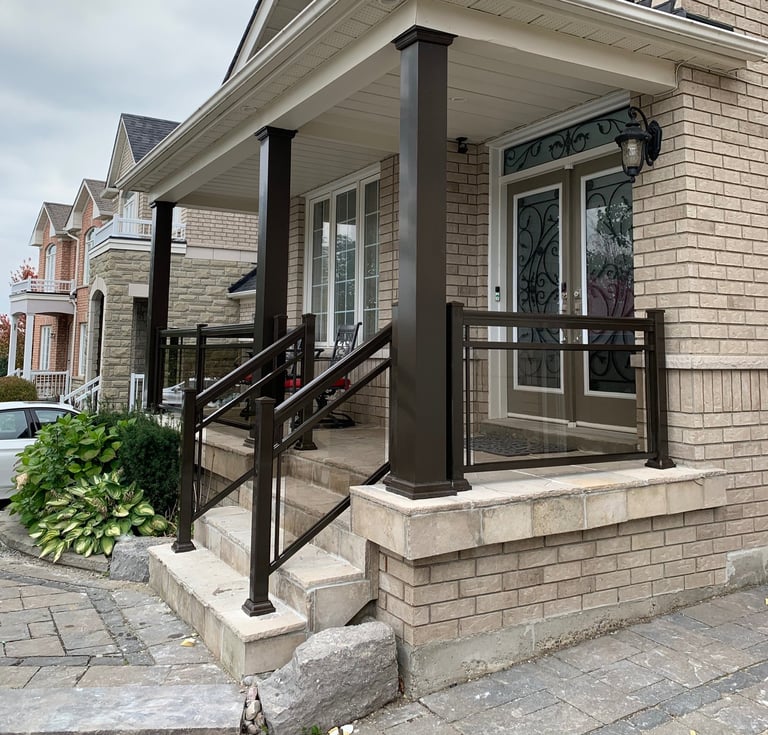 front porch with brown collumns improve the look of the house
