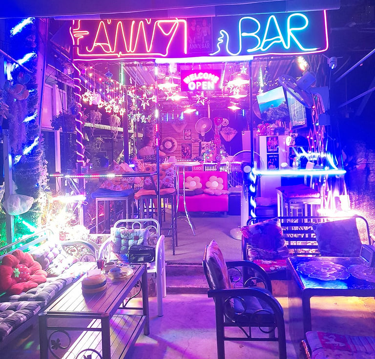 Outside view of Anny Bar under neon lights on Soi 94, Hua Hin