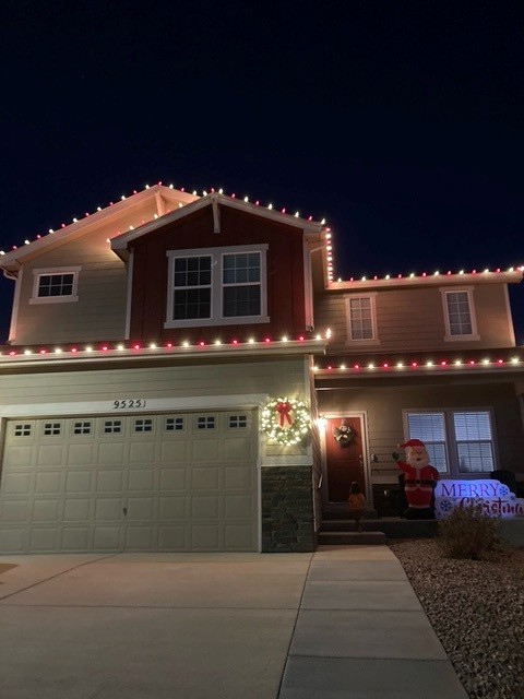 Christmas Lights on house eave in Peyton Colorado