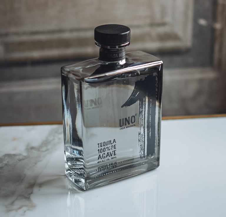a bottle of Tequila Uno Cristalino - premium tequila cristalino