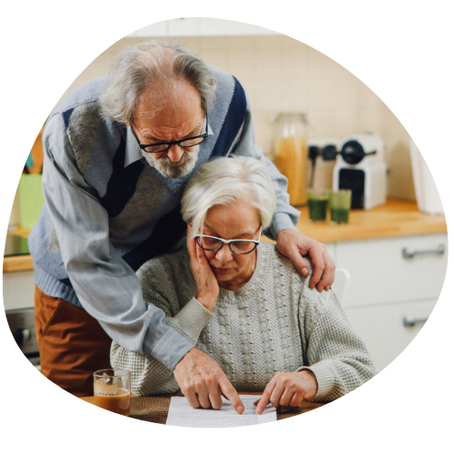 Elderly couple reading guide