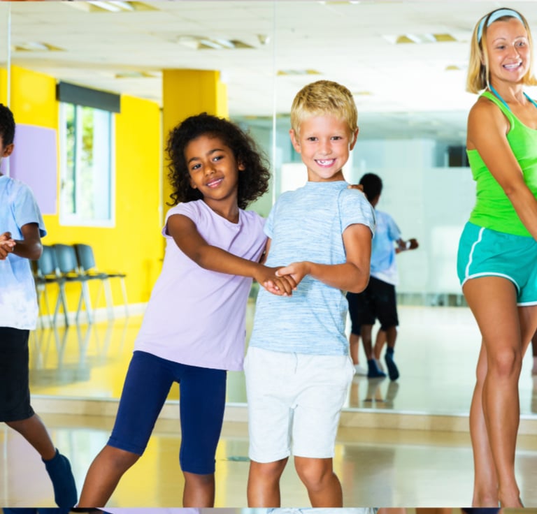 diverse group of kids practicing dancing ballroom style