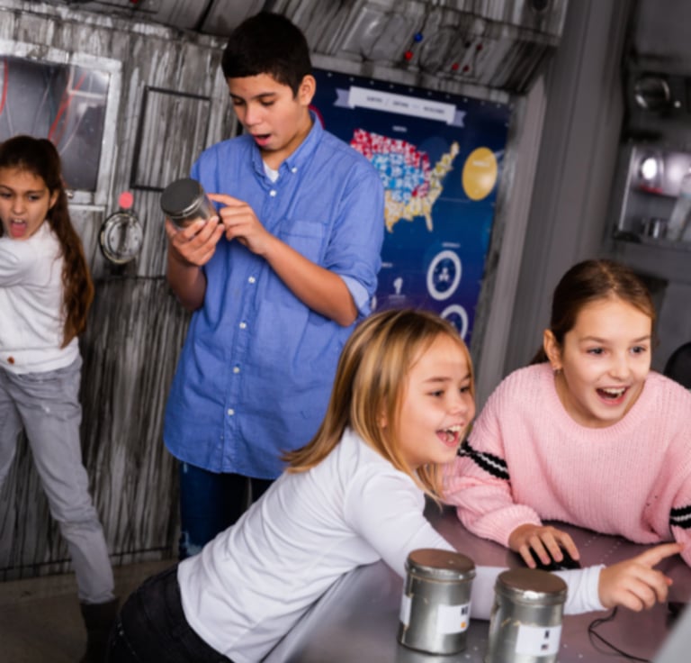 kids in escape room laughing
