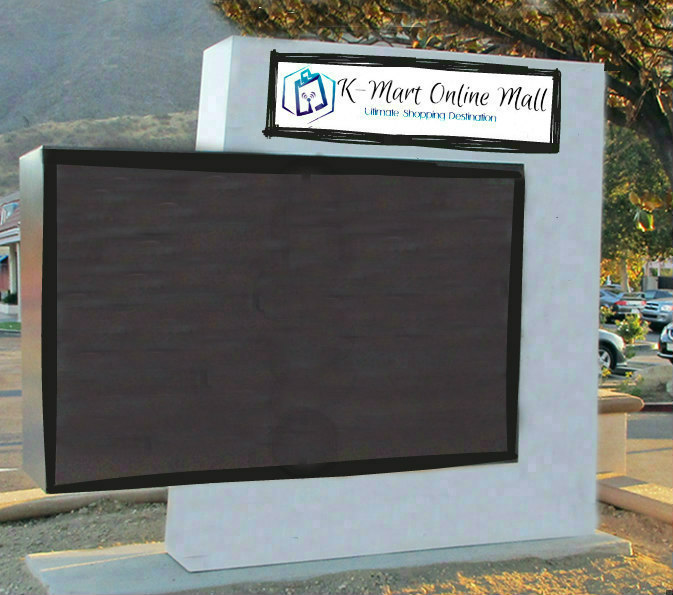 a large screen tv screen in front of a building