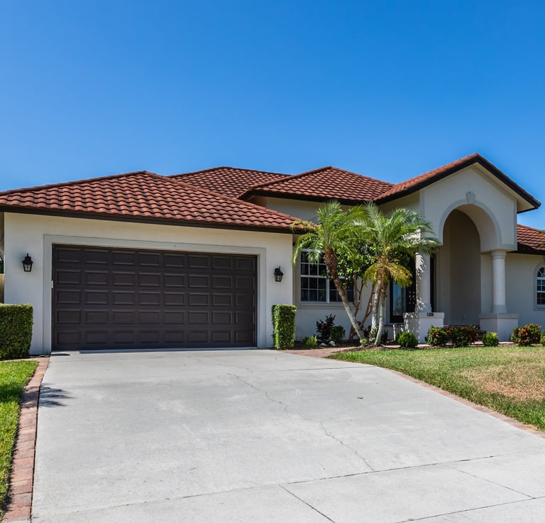 New concrete driveway St. Petersburg FL with smooth finish and curb appeal
