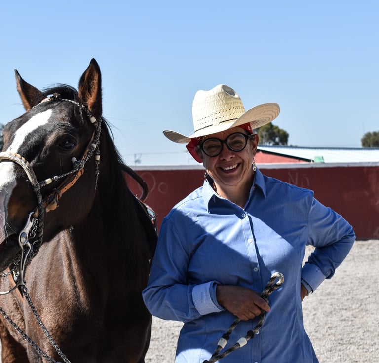 a woman in a cowboy hat and a cowboy hat