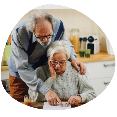 Elderly couple reading guide