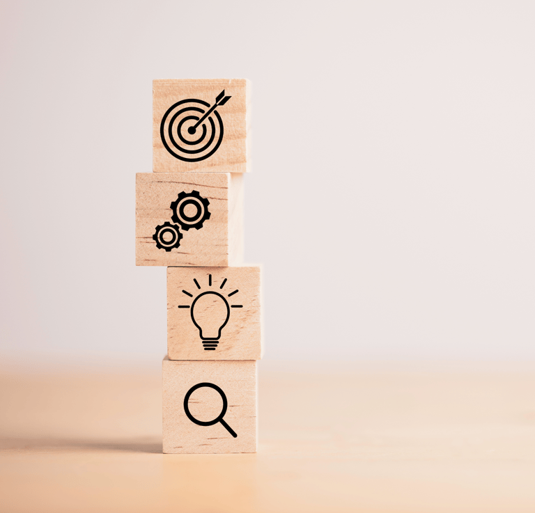a stack of wooden blocks with a magnifying image of a light bulb and
