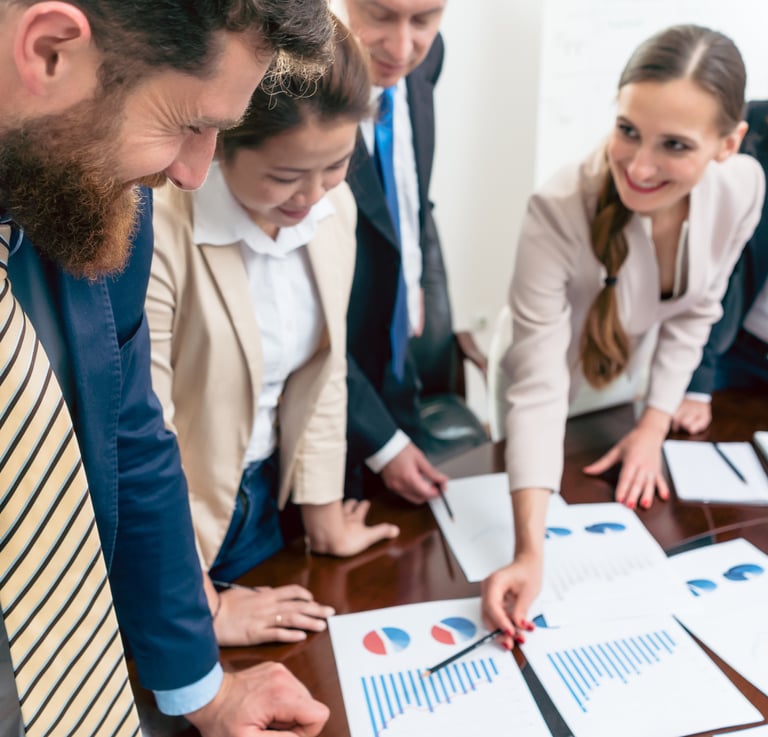 a group of business people working on a project