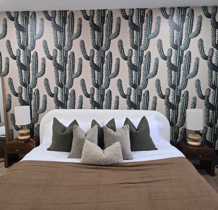 Scottsdale Airbnb interior with custom cactus wallpaper accent wall installation