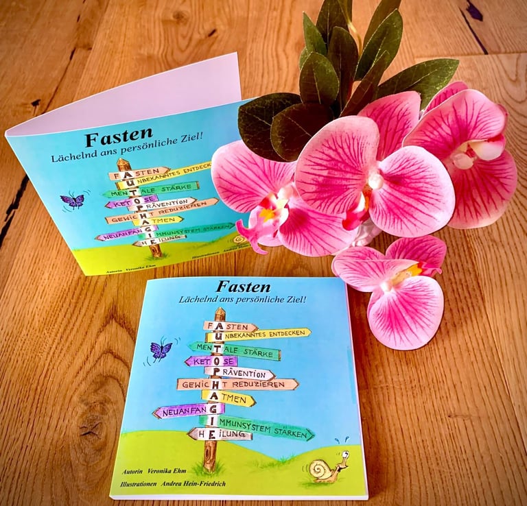 a book with a flower and a bookmark on it