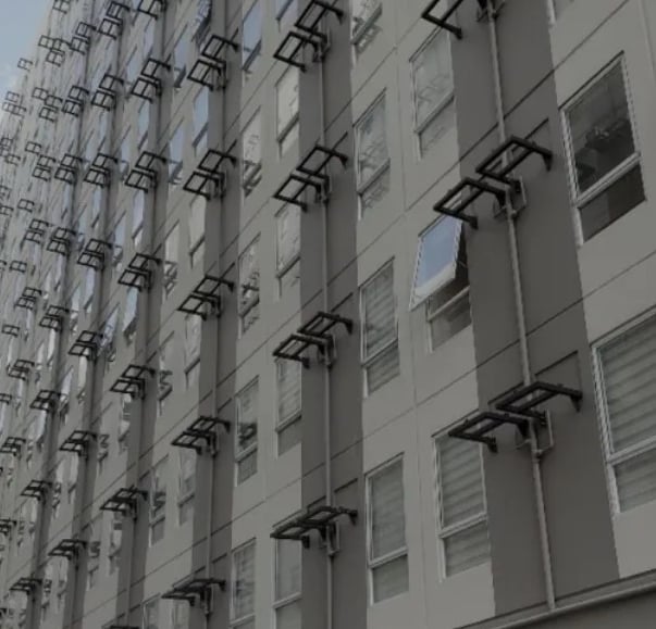 a building with a bunch of windows and a clock on it