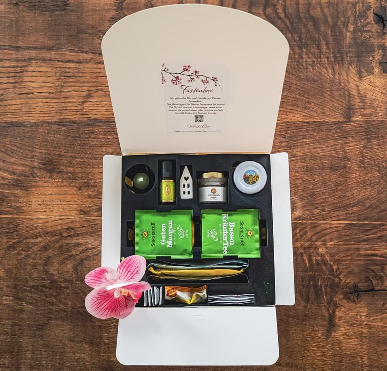 a box with a flower and a flower in it