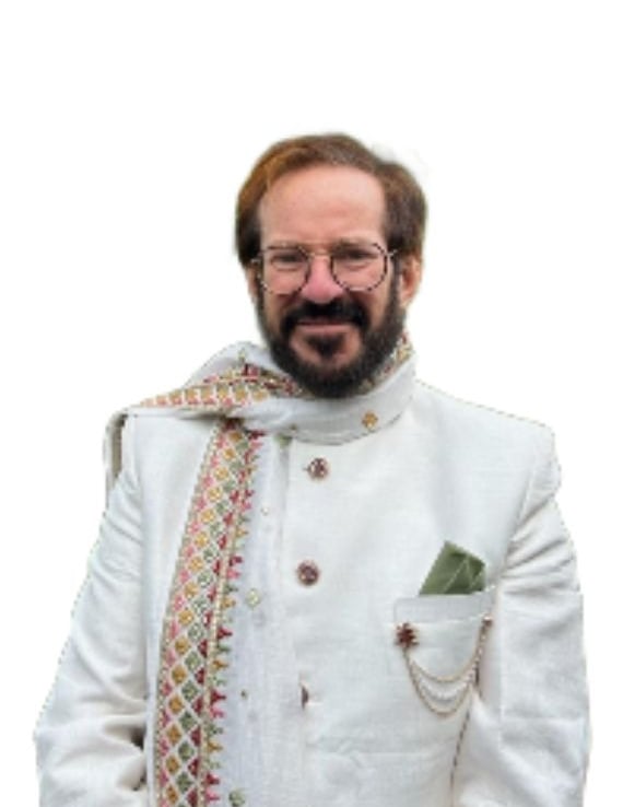 a man in a white jacket and a green tie