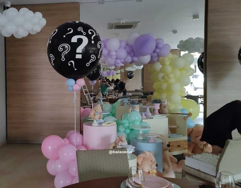 a table with balloons and balloons and balloons