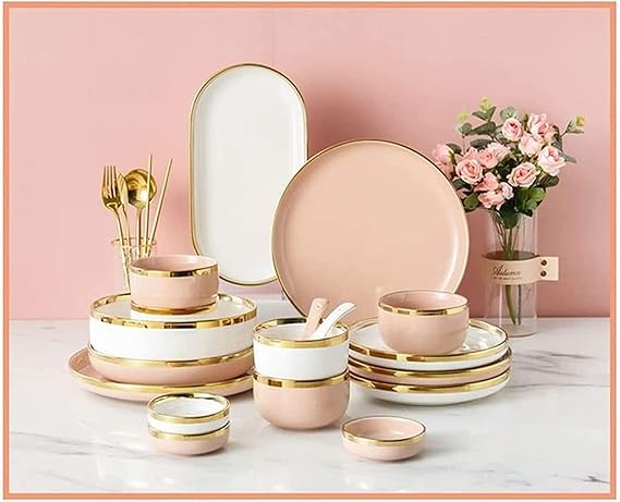 Blush pink ceramic dinner set with gold accents, stylish luxury tableware for elegant dining.