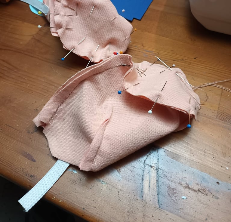 sewing a doll body out of fabric