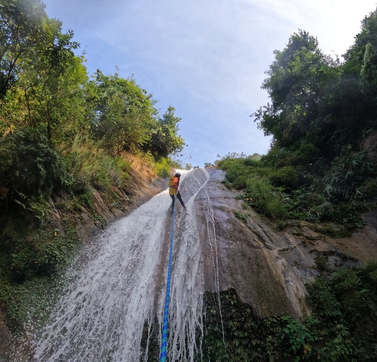 canyoning down a waterfall