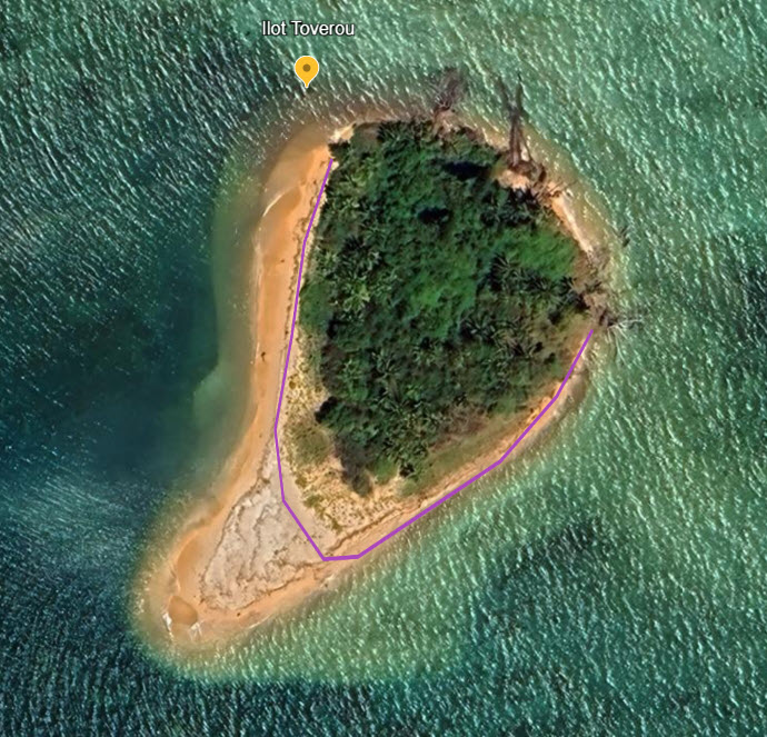 a small island with a small island in the middle of the ocean