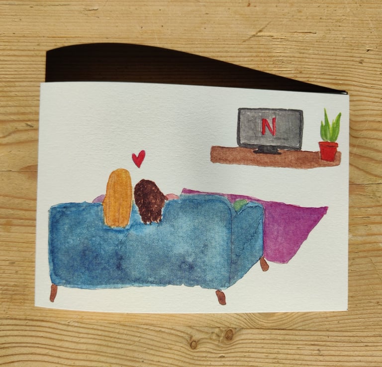 a queer greetings card of a couple on the sofa watching netflix
