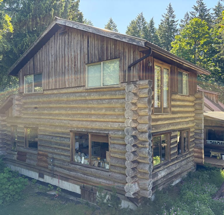 Log home in Courtenay on Vancouver Island before it was restored by Embassy Restorations 
