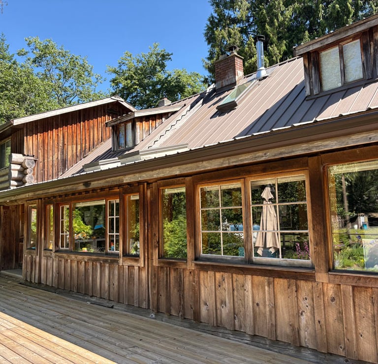 Log home in Courtenay on Vancouver Island before it was restored by Embassy Restorations 