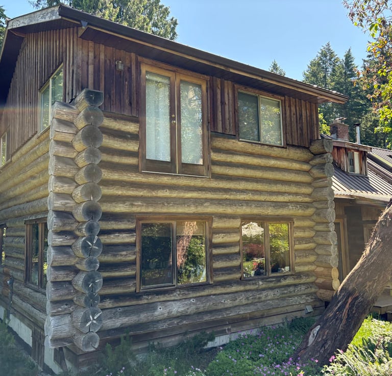 Log home in Courtenay on Vancouver Island before it was restored by Embassy Restorations 